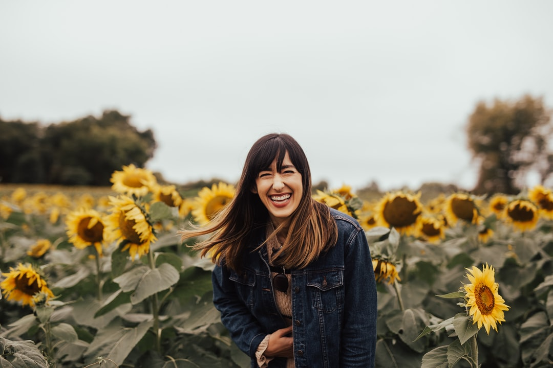Happy girl, sunflower field